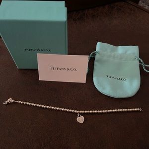 Small tag Tiffany and co bearded bracelet
